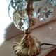 Rococo lamp, chiseled bronze base, fake candle and crystal pendants