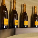 Circular bar in brushed metal, wood and carpet. 1970s.