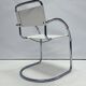 Vintage tubular frame chairs with white skai