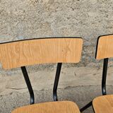 Chairs in black and light brown formica