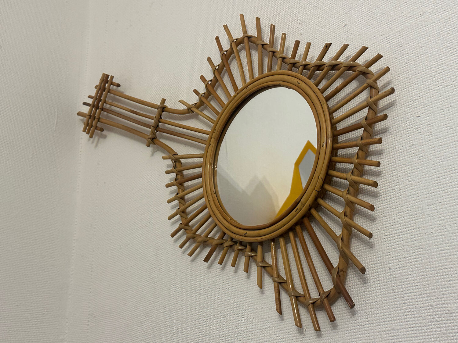 The vintage guitar rattan mirror.