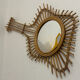 The vintage guitar rattan mirror.