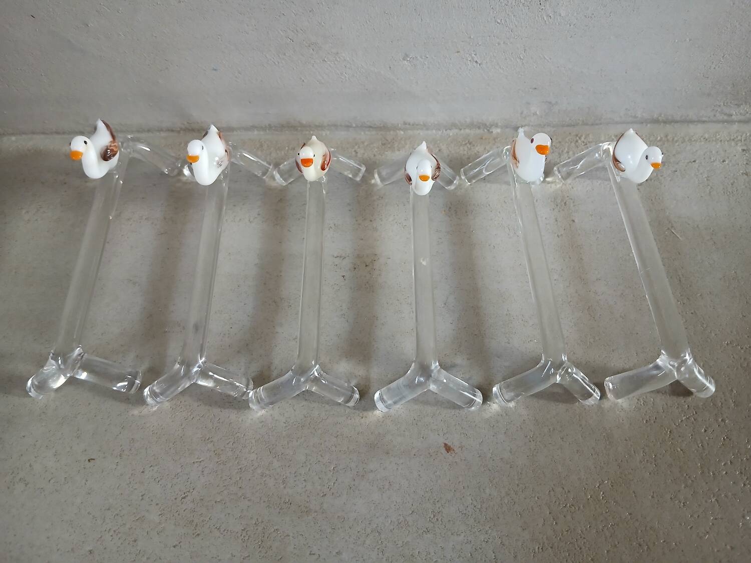 14 antique glass knife rests / ducks
