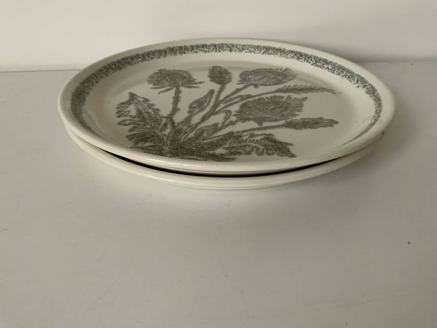 Duo of thistle plates