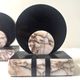 Art Deco bookends with a circular design in black and pink marble.