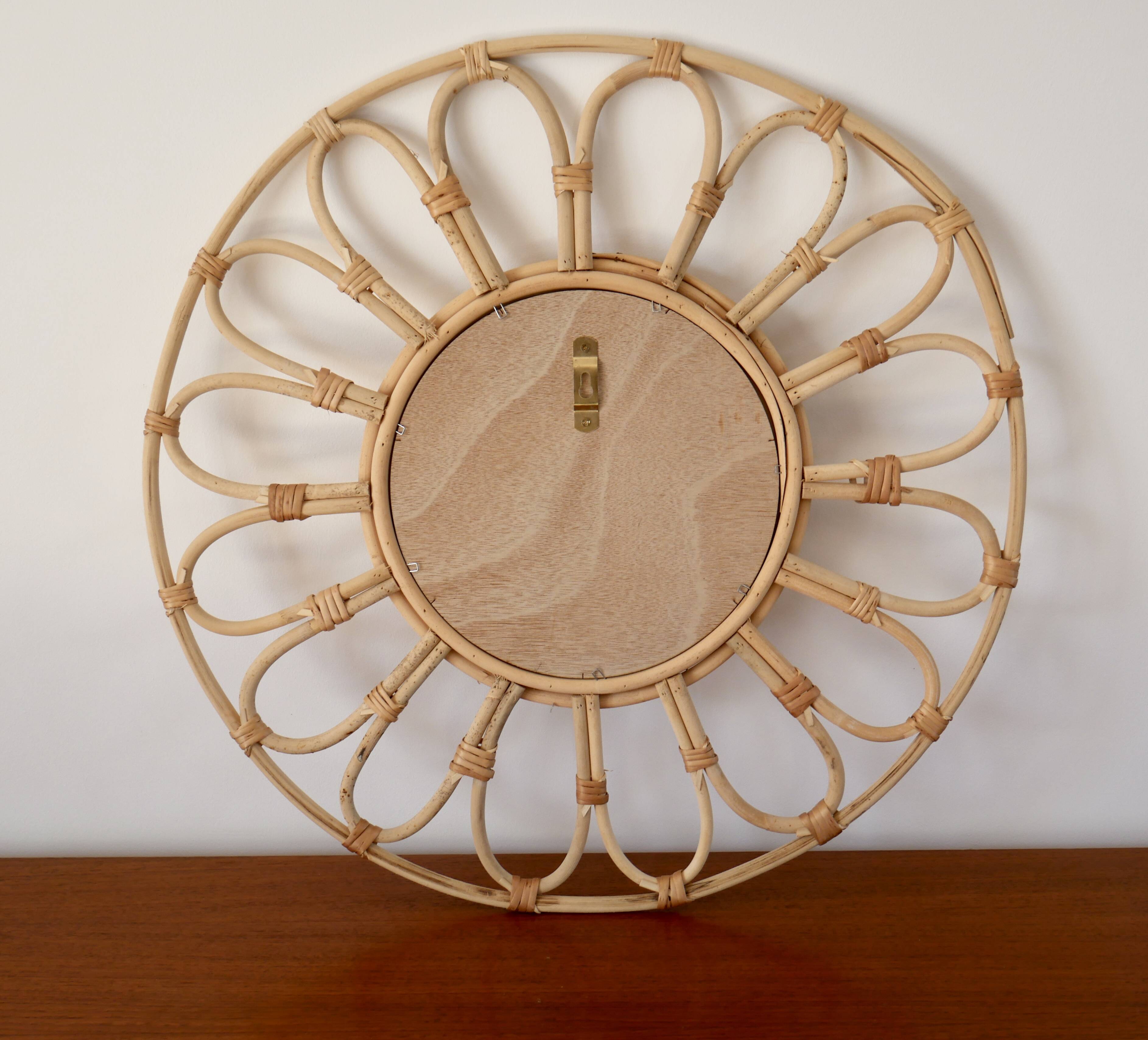 Vintage rattan and bamboo sun mirror