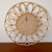 Vintage rattan and bamboo sun mirror