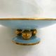 Art Deco modernist coupe, with a base of 3 spheres, in turquoise ceramic and gilding.