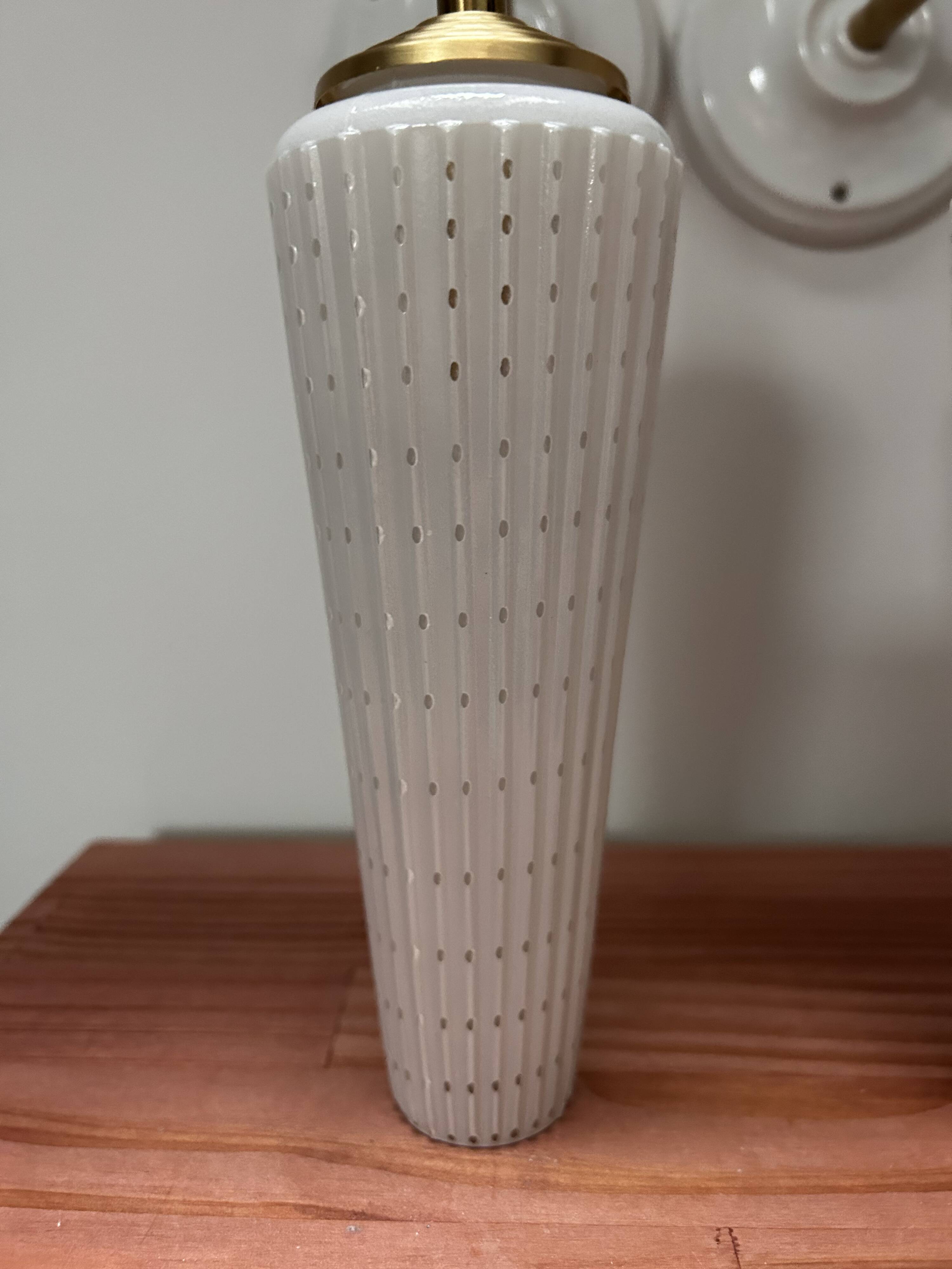 Pair of white and gold wall sconces