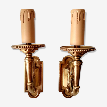 Pair of sconces in gilded bronze and chiseled with 1 arm of light
