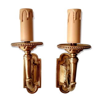 Paire d'appliques  en bronze doré et ciselé  à 1 bras de lumière