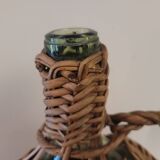 Green glass carafe with wicker covering – 2 litres – 1960s–1970s