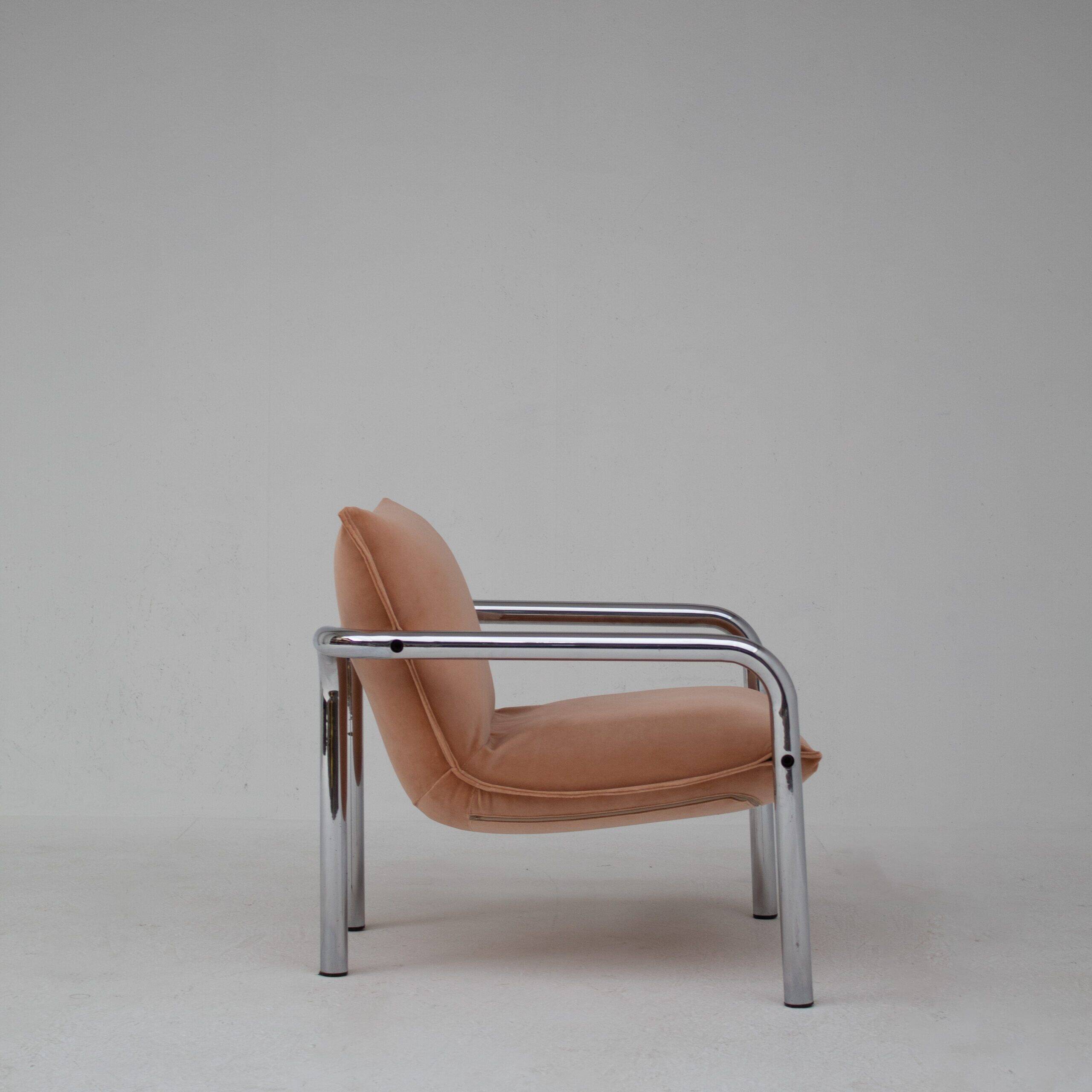Pair of tubular armchairs in salmon velvet
