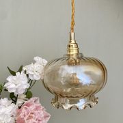 Suspension globe vintage en verre ambré