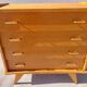 commode vintage aux pieds compas