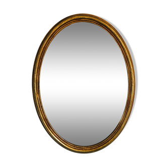 Oval mirror in gilded wood 80x58 cm