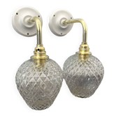 Pair of chiseled glass wall sconces