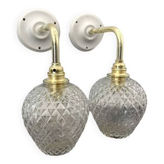 Pair of chiseled glass wall sconces