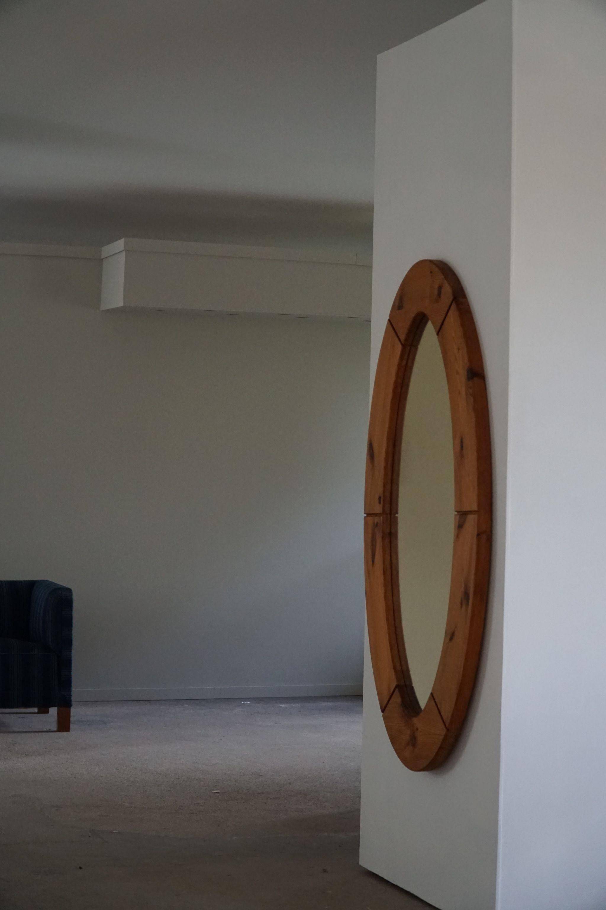 Large oval wall mirror in solid pine by Glasmäster Markaryd, Sweden, 1960s.