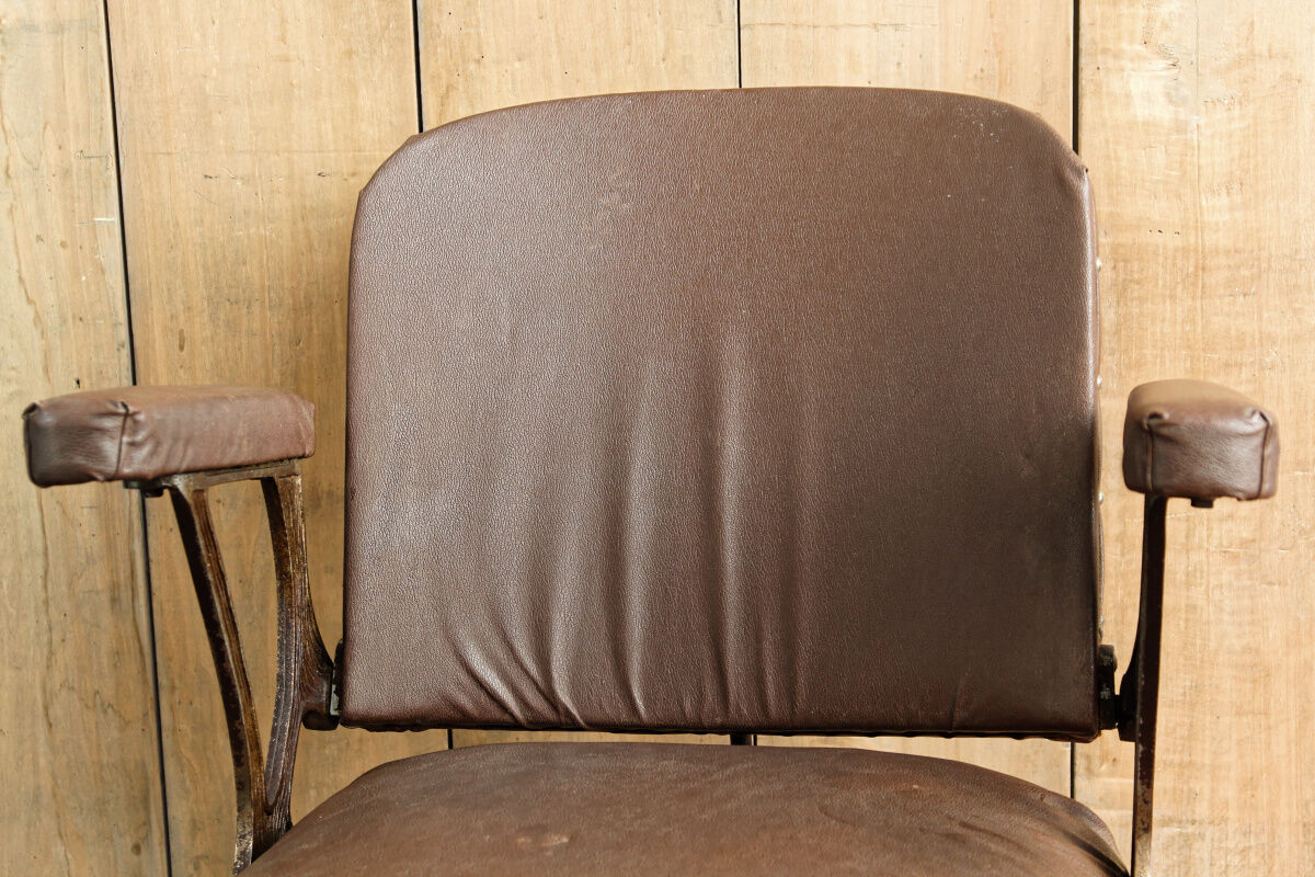 Hairdresser's armchair, early twentieth, enamelled cast iron