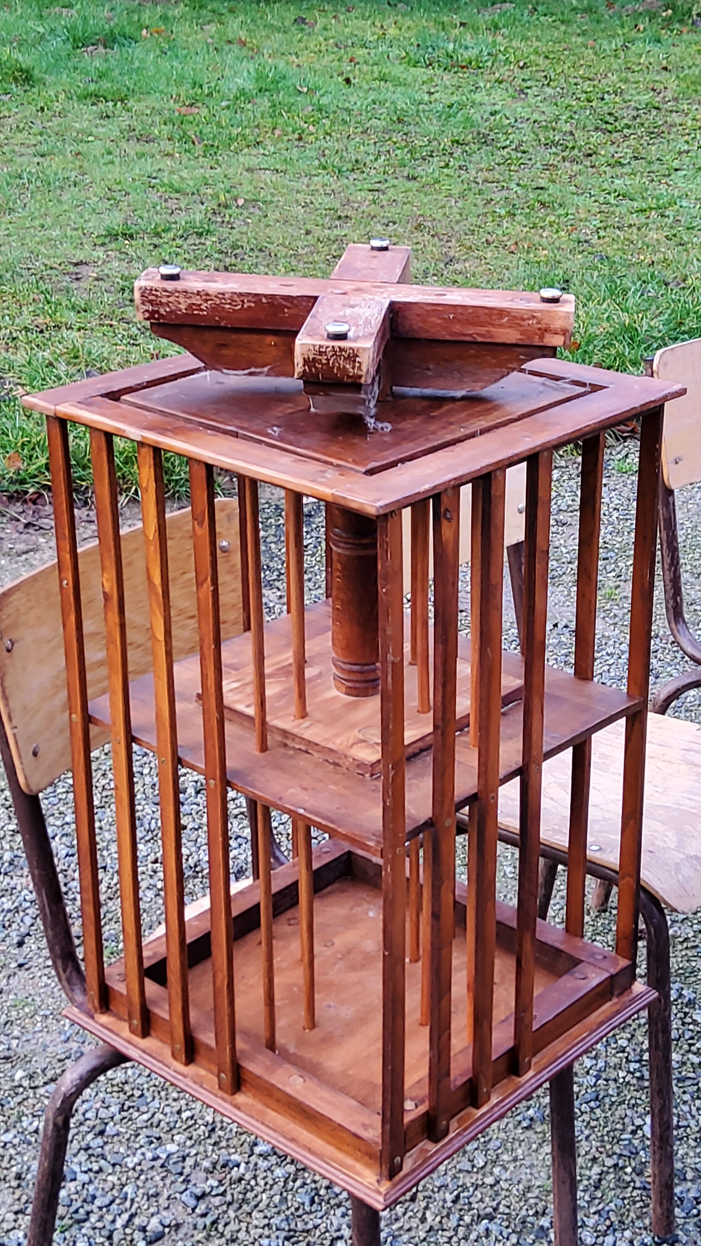Art Deco style revolving bookcase in walnut and oak