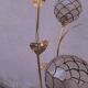 Floral floor lamp in pearlescent Capiz, 1970s.