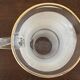 Jug + 6 frosted glass tumblers with white and gold rim.