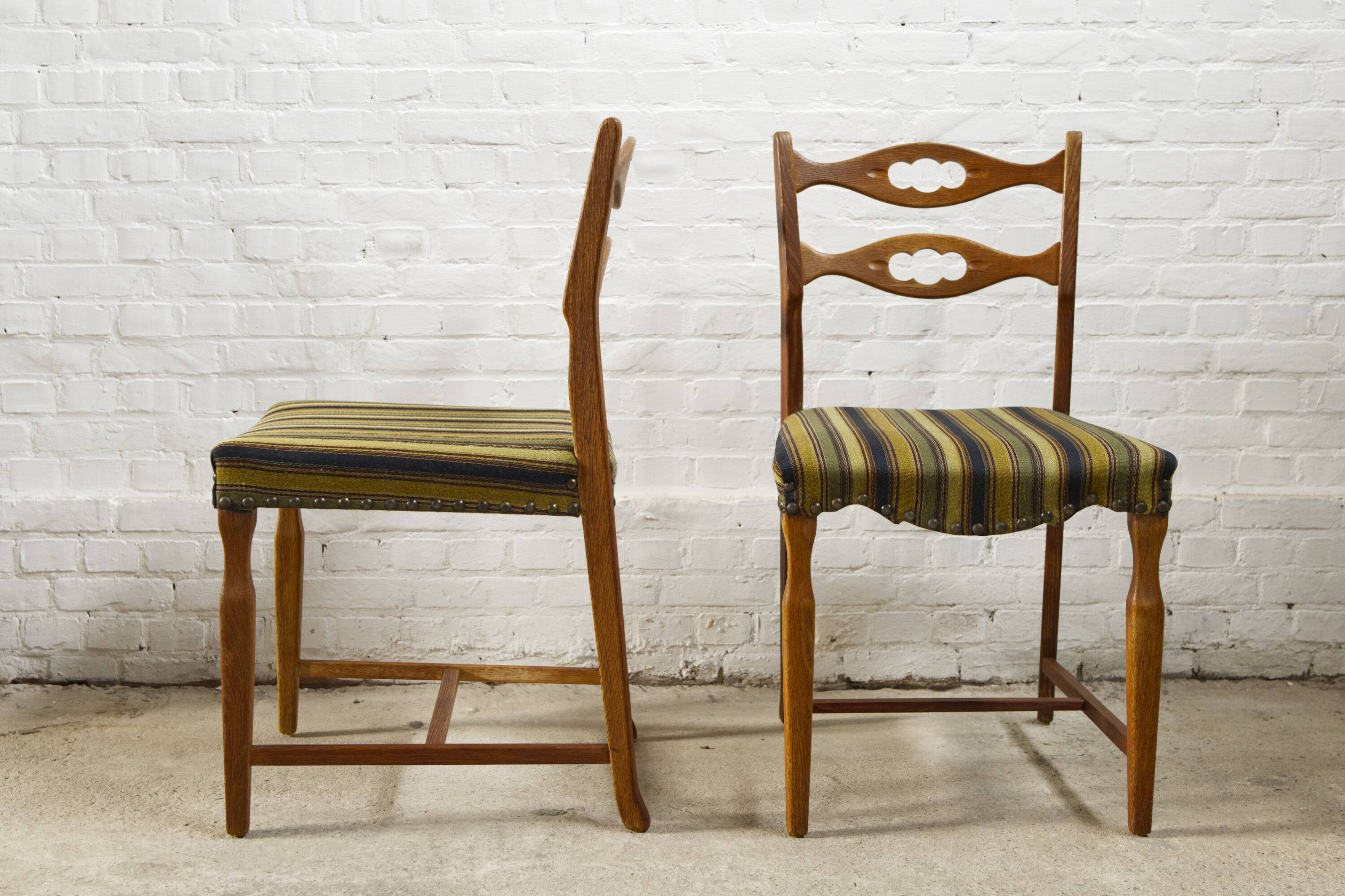 Set of four oak and wool dining room chairs by Henning Kjaernulf, 1960's
