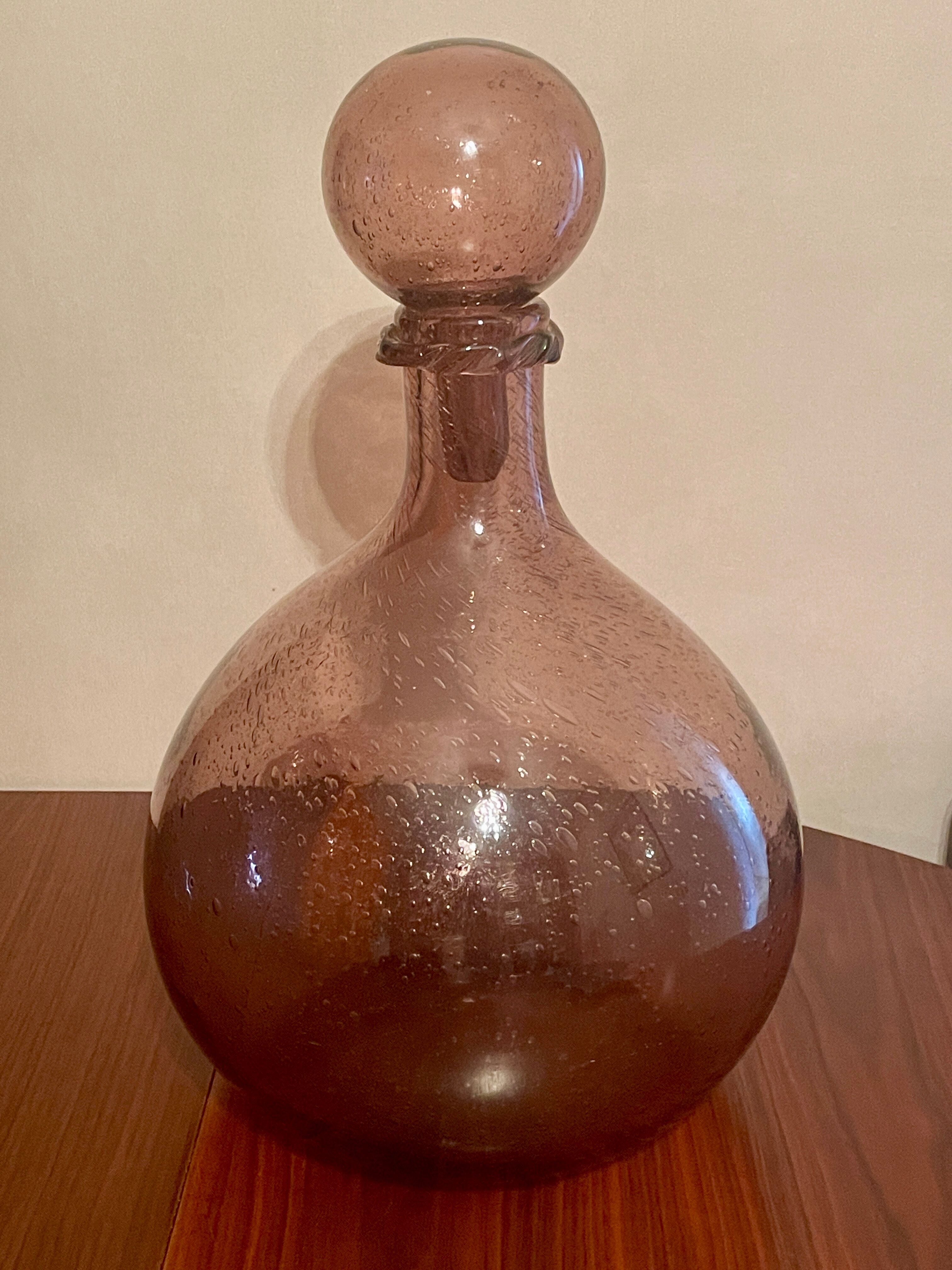 Bottle  in blown and bubbled glass
