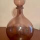 Bottle  in blown and bubbled glass