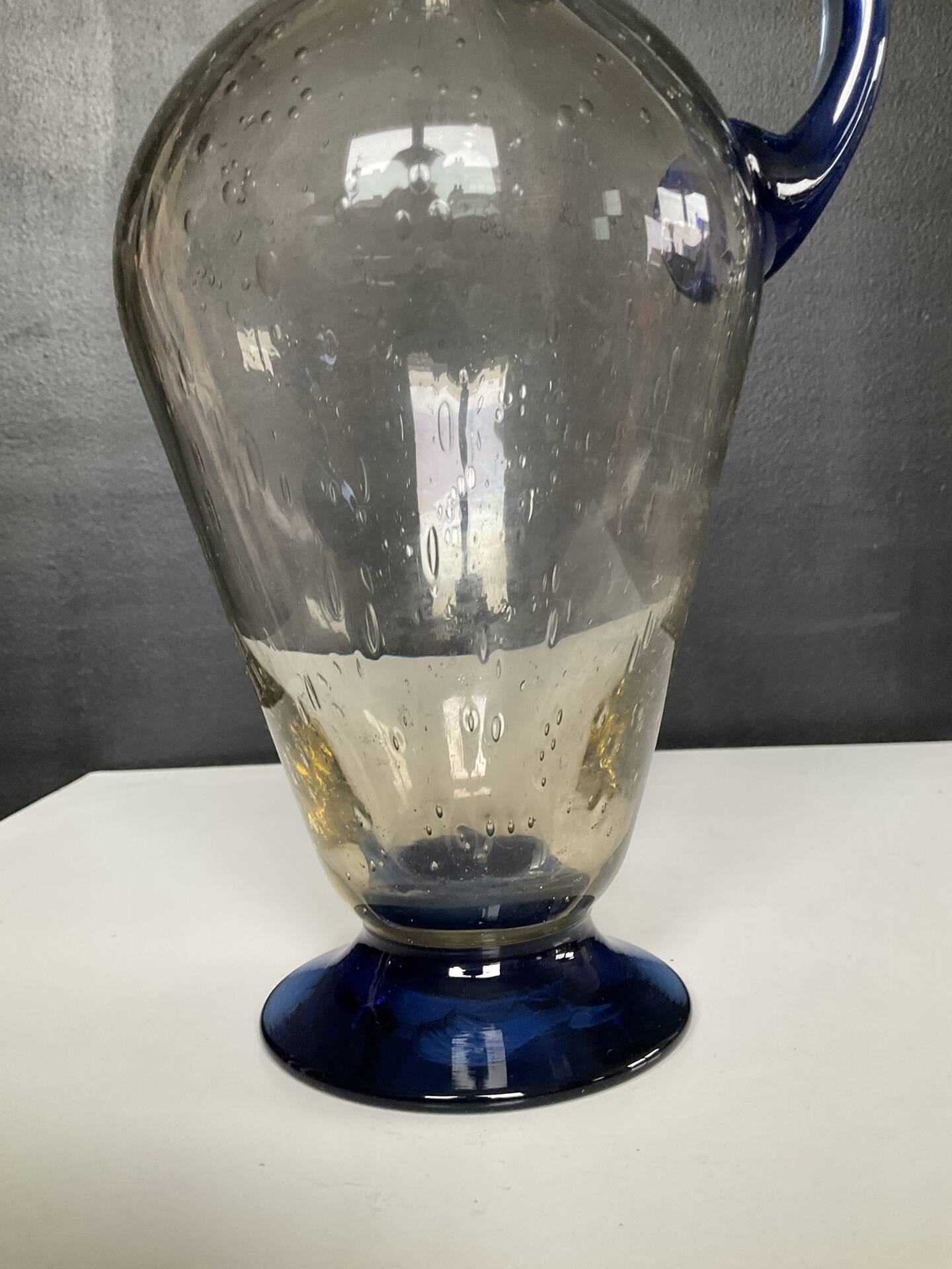Vintage carafe in blown and bubbled glass paste.