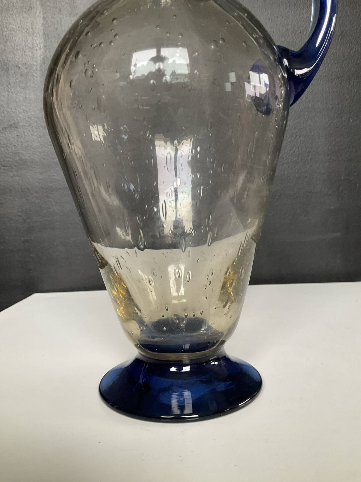 Vintage carafe in blown and bubbled glass paste.