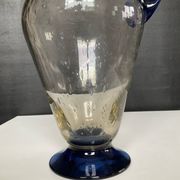 Vintage carafe in blown and bubbled glass paste.