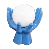 Ceramic lamp hands holding blue globe