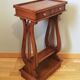 Pedestal table or English cherry saddle with lyre feet
