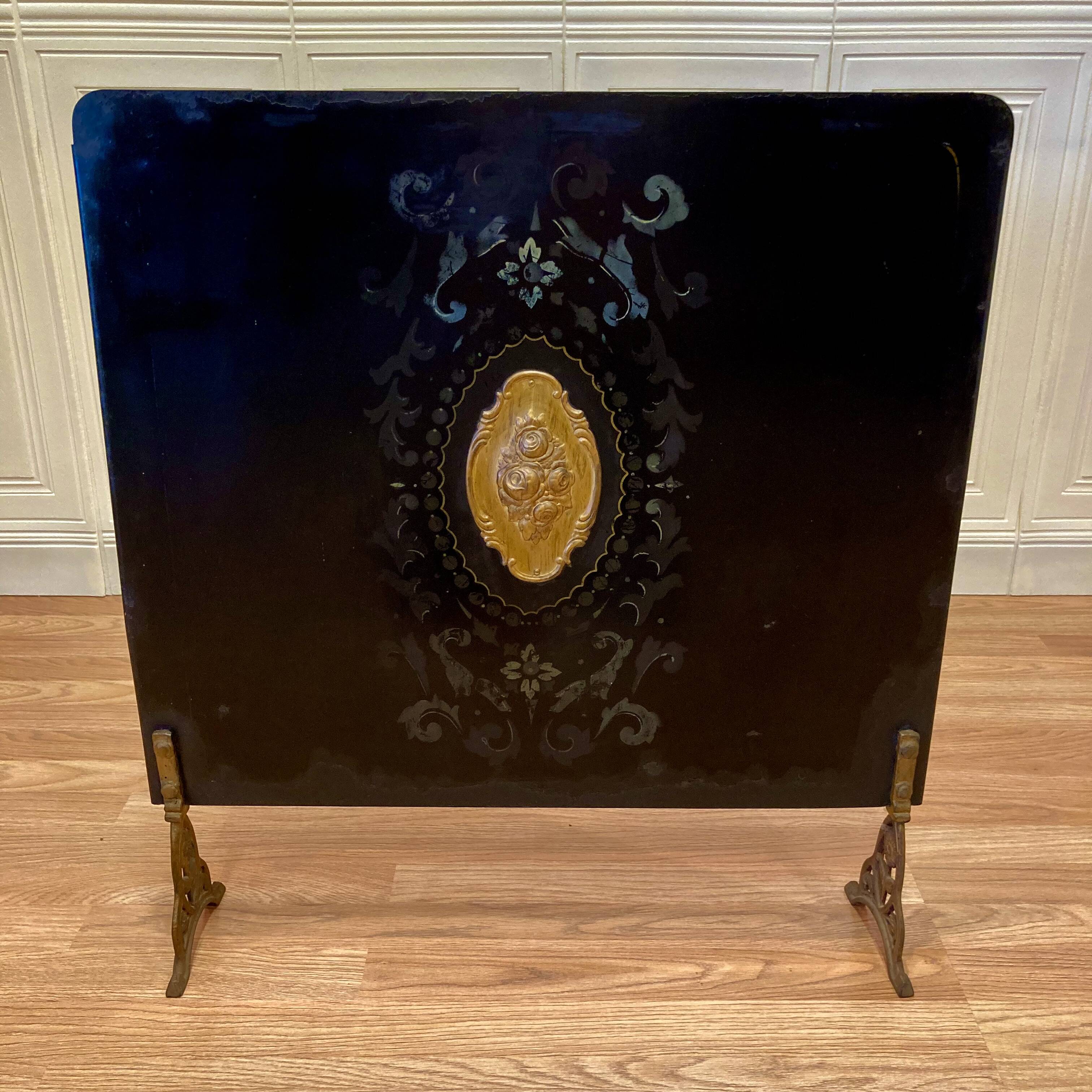 Metal fireplace screen from the period.