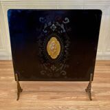 Metal fireplace screen from the period.