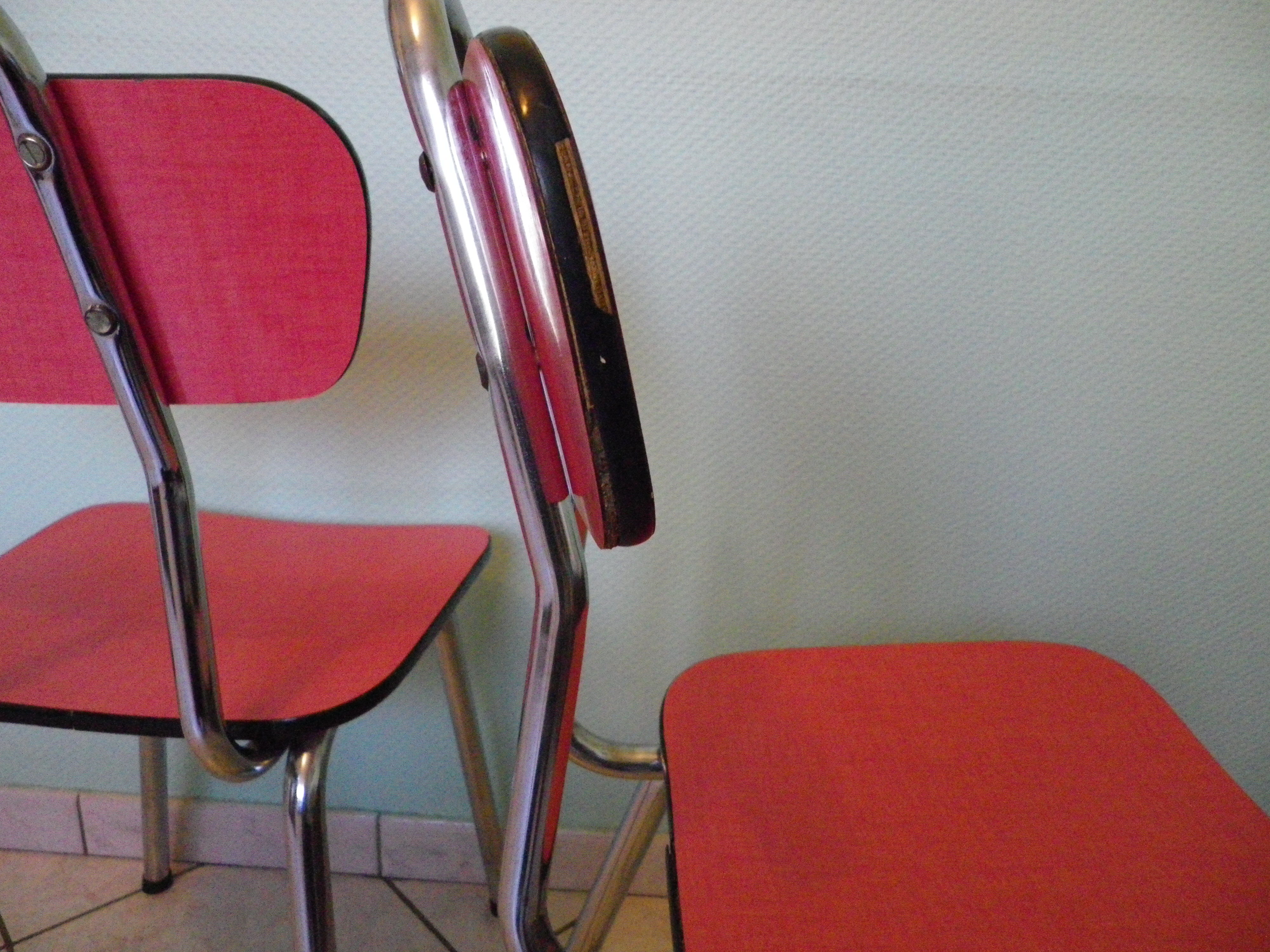 Lot of 2 chairs in red formica with tubing 60s