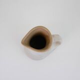 Signed white beige ceramic pitcher