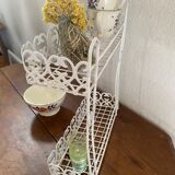 Openwork metal shelf