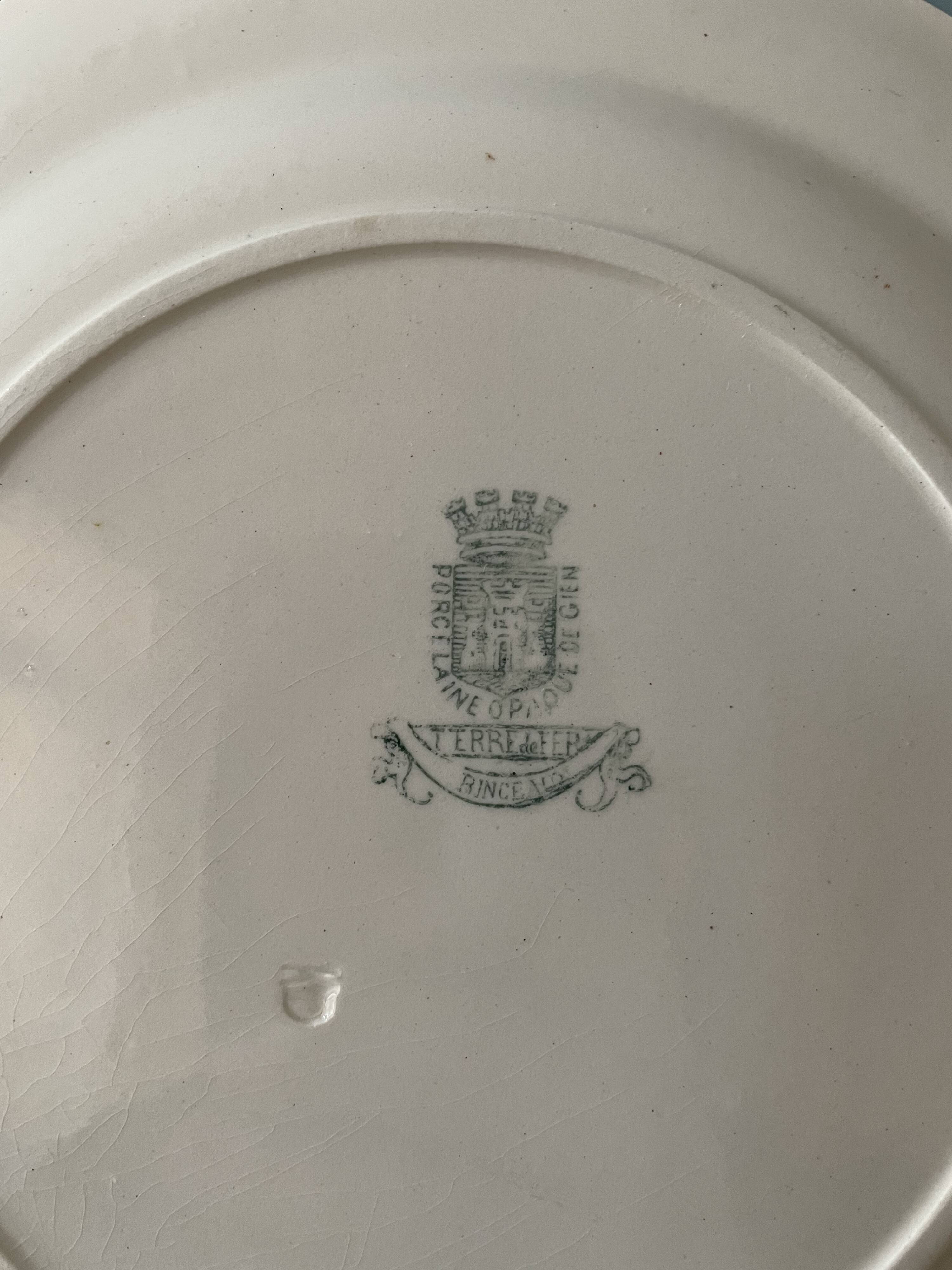 Set of 12 flat plates Terre De Fer XIXth in opaque porcelain of Gien, model Rinceaux
