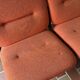 Strafor 3-seater bench, orange upholstery and sled base, 1970s.