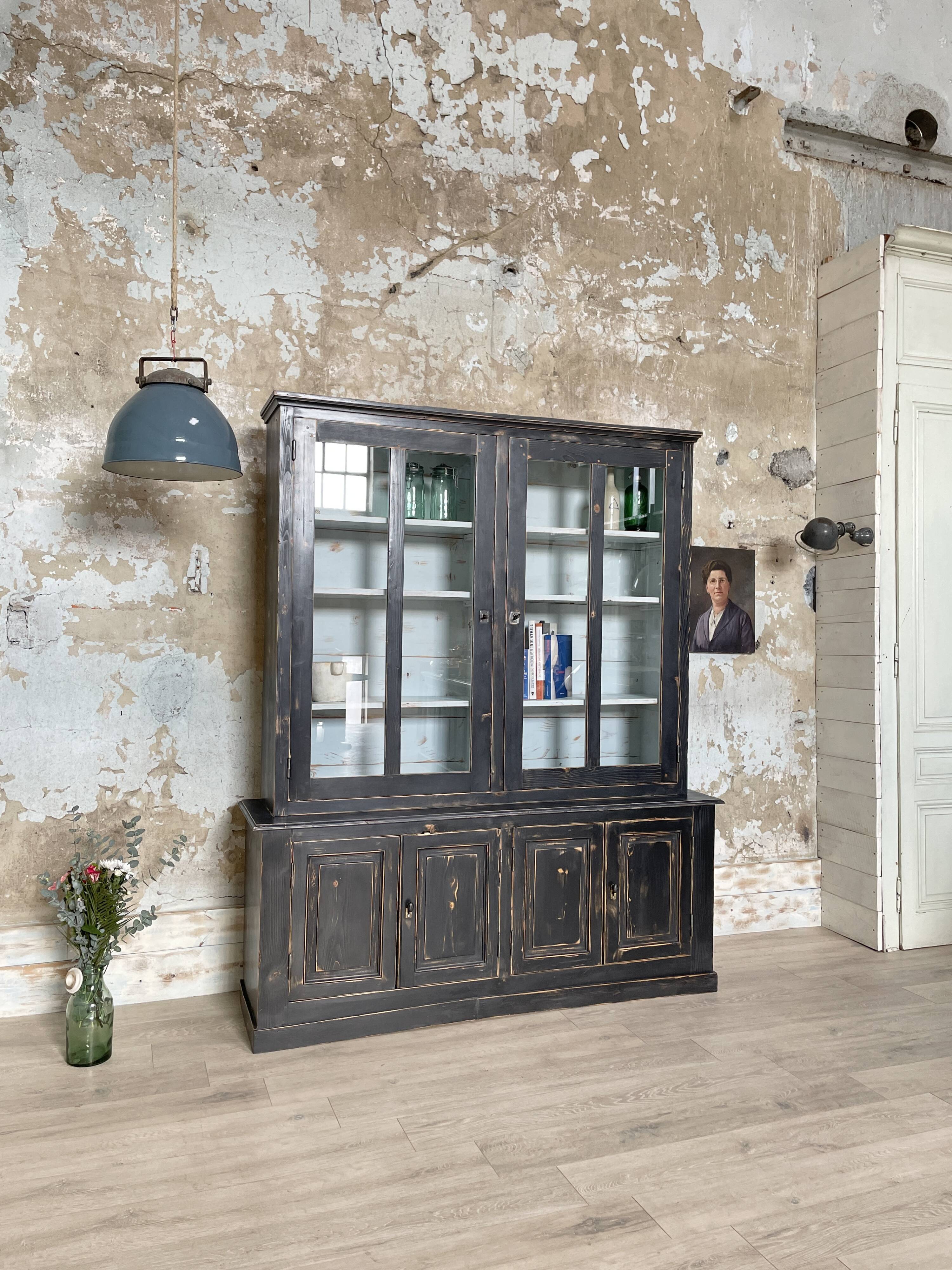 Display cabinet in patinated wood