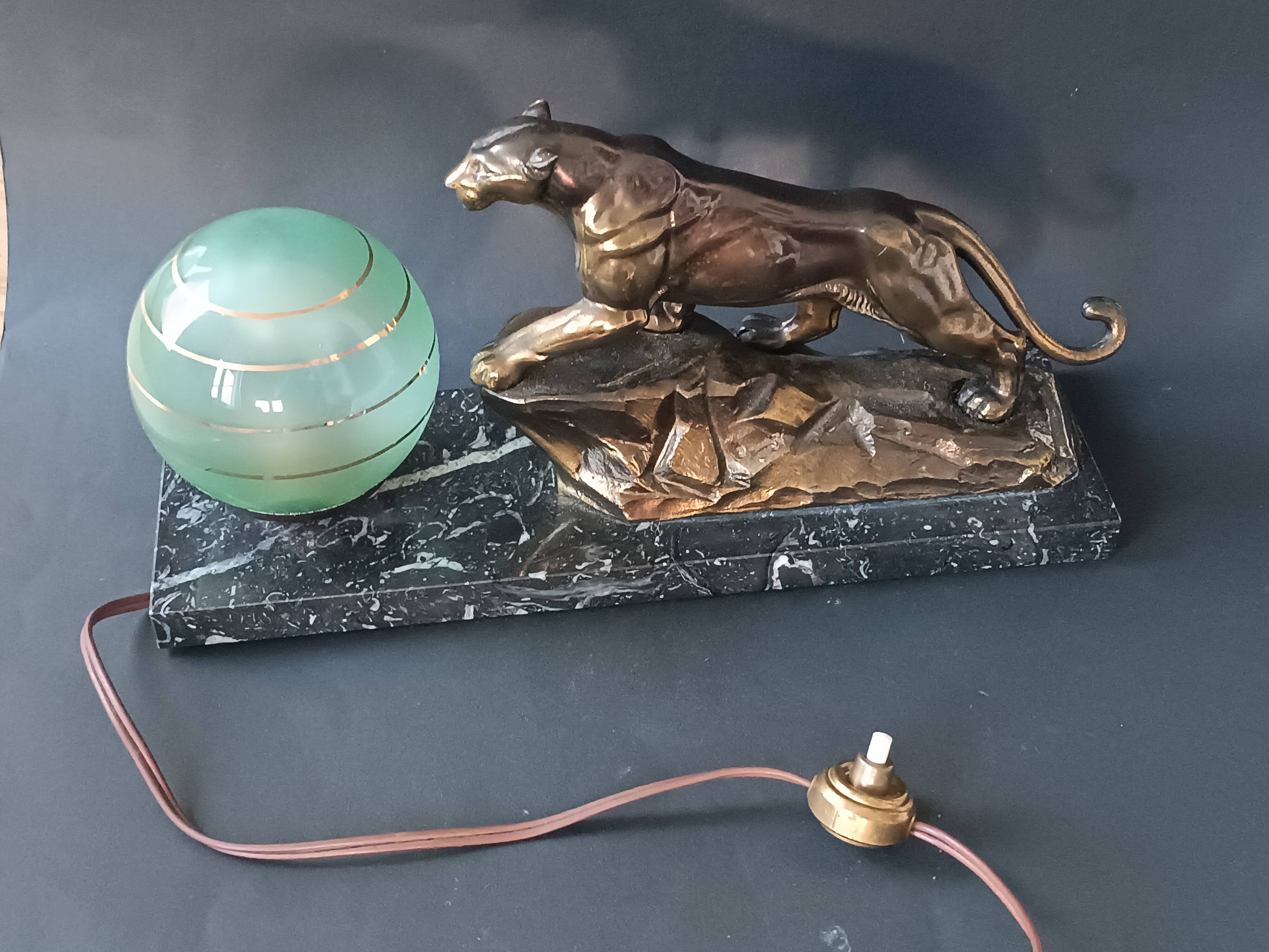 Panther desk lamp in spelter on a black and white marble base 1925
