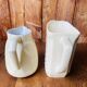 A pair of vintage ceramic jugs from the 1950s.