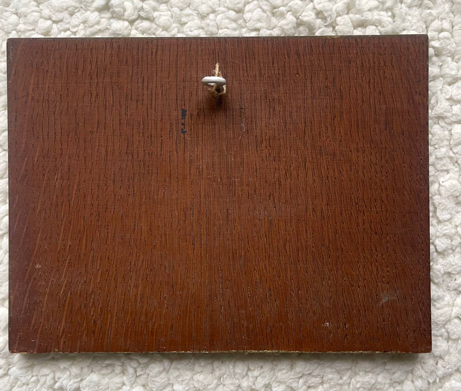 Small painting on wood.