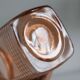 Vintage pink glass grocery jar