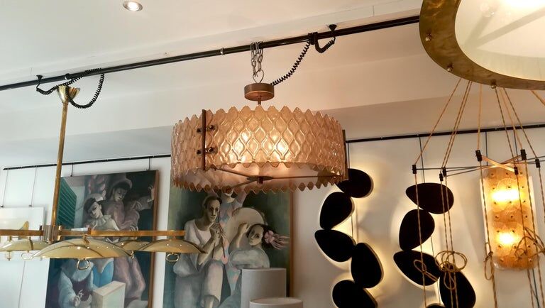 Patinated brass lurstre, and Murano glass