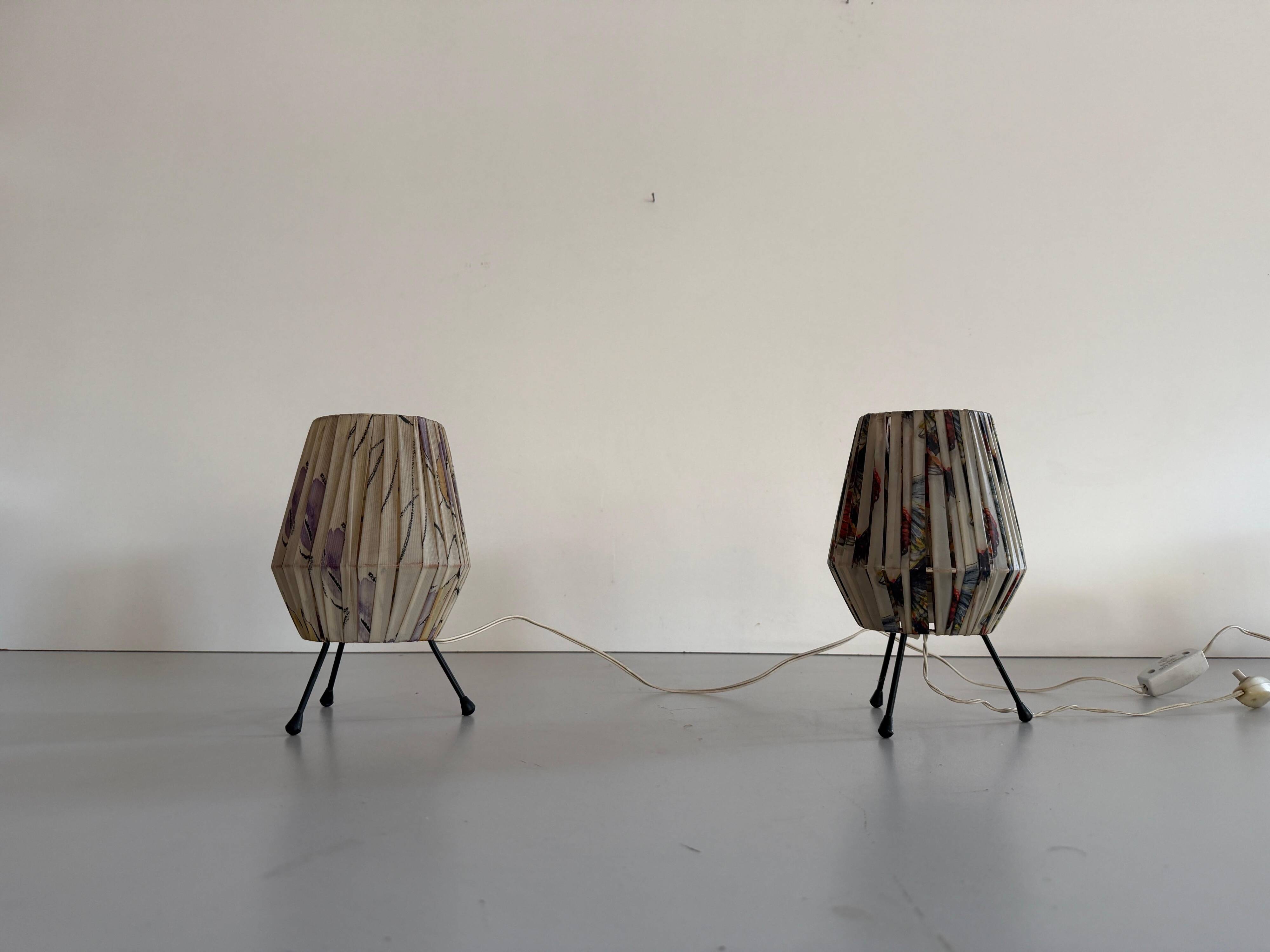 Pair of table lamps with plastic shades and tripod base, 1960s, Italy