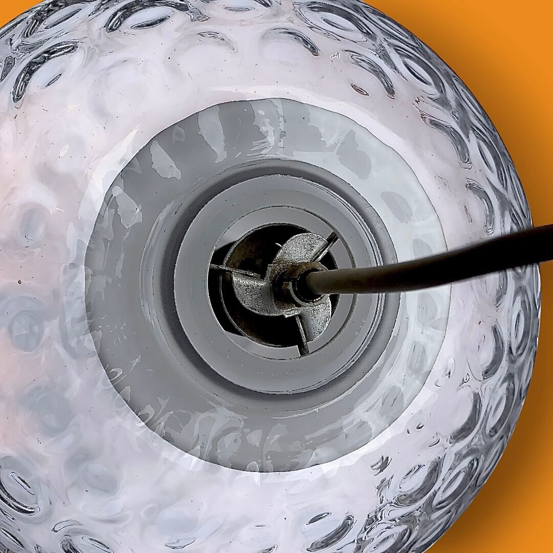 Spherical pendant light in bubbled and opaque blown glass